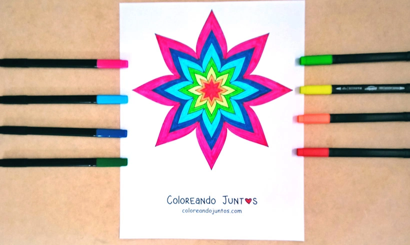 Dessin de mandala en forme d'étoile colorié par Colorions Ensemble