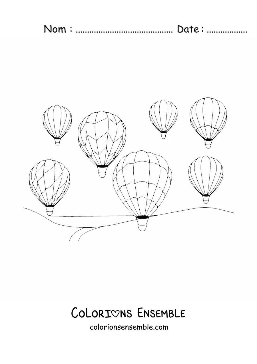 Image à colorier de plusieurs montgolfières dans les airs au-dessus d’un paysage