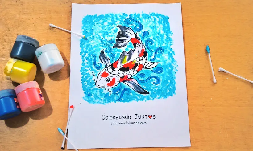 Coloriage d’un poisson koï peint avec des cotons-tiges